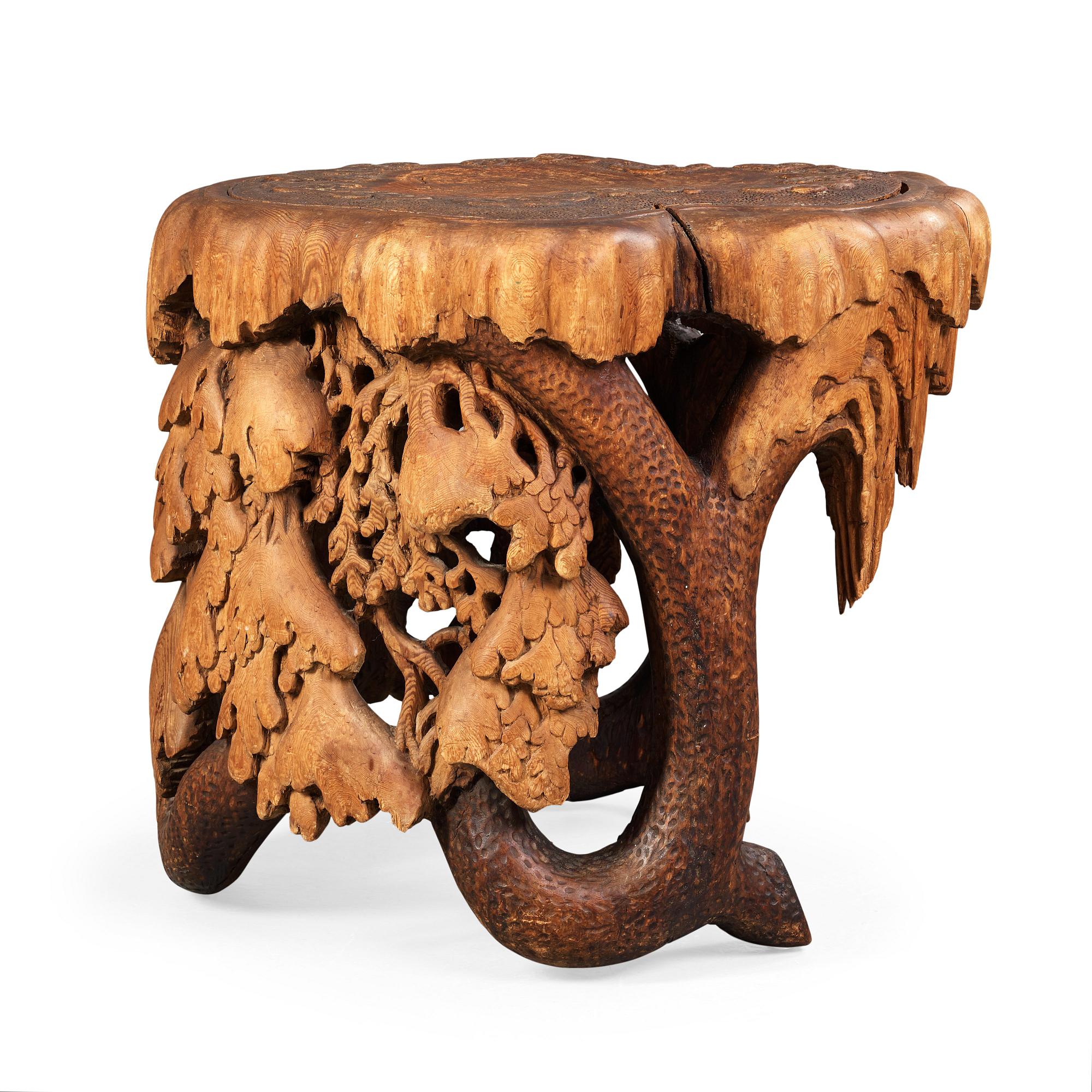 Knut Fjaestad, A Knut Fjaestad Art Nouveau sculptured pine table, Sweden ca 1900.