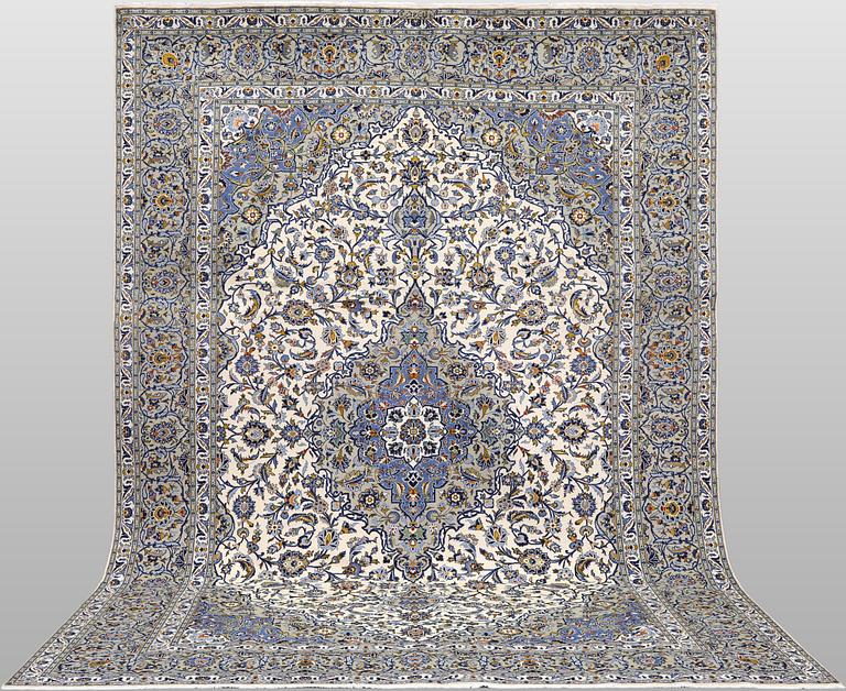 A Keshan carpet, signed, 386 x 281 cm.