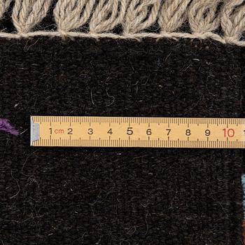 A hand-embroidered Kelim carpet, c. 198 x 153 cm.