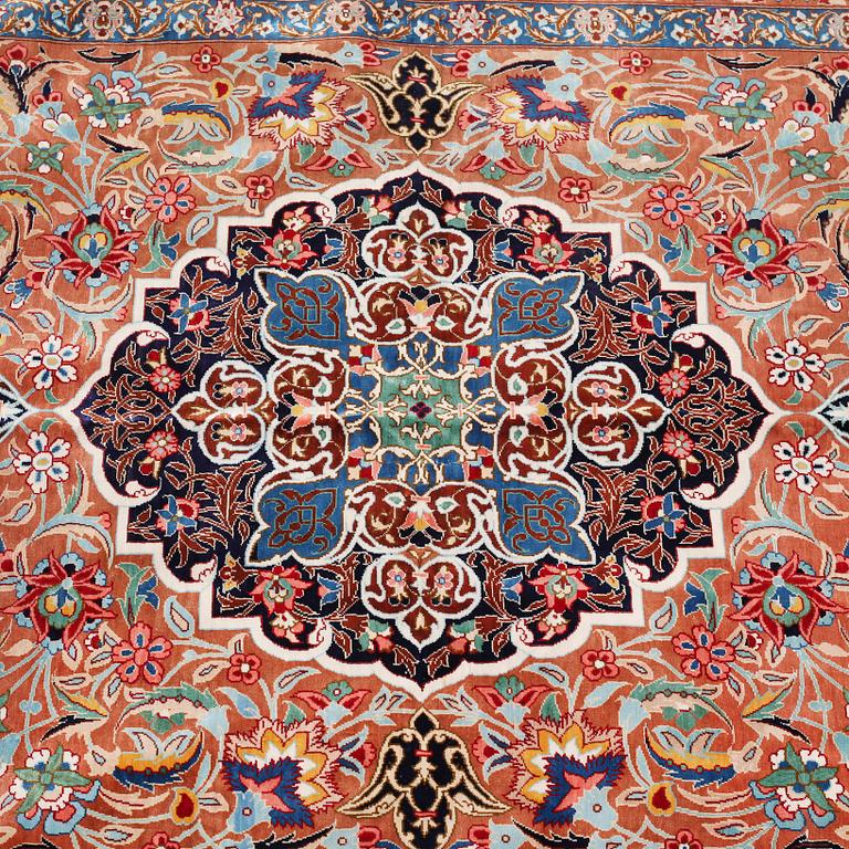 A Ghom rug, silk, signed, ca 144 x 102 cm.