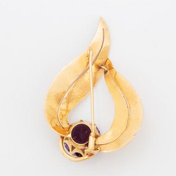 Brosch guld med ametist.