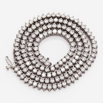 Kaulakoru, 18K valkokultaa ja briljanttihiottuja timantteja.