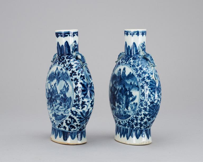 Two blue and white moon flasks, late Qing about 1900.