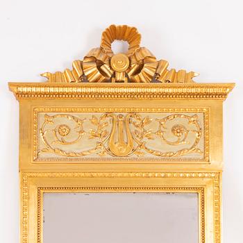 A late-Gustavian giltwood mirror, Stockholm, late 18th century.