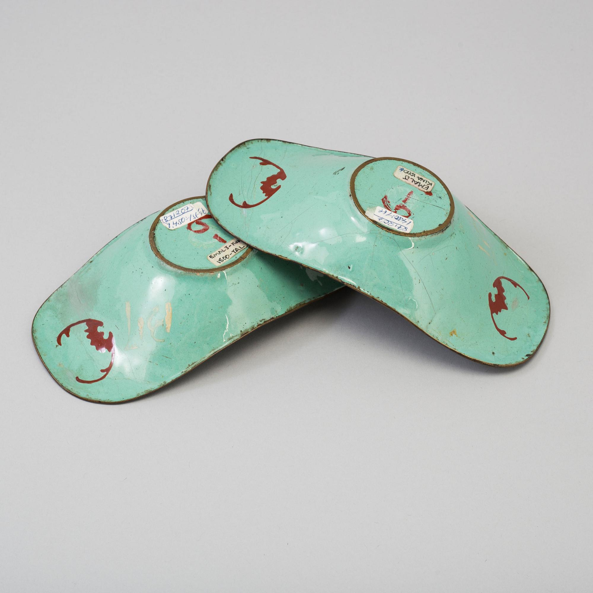 A pair of circa 1900 Qing dynasty enamel saucers.