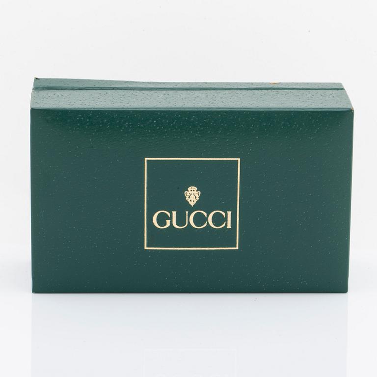 GUCCI wristwatch 23 mm w interchangable rings of plastic, quartz movement, original box.