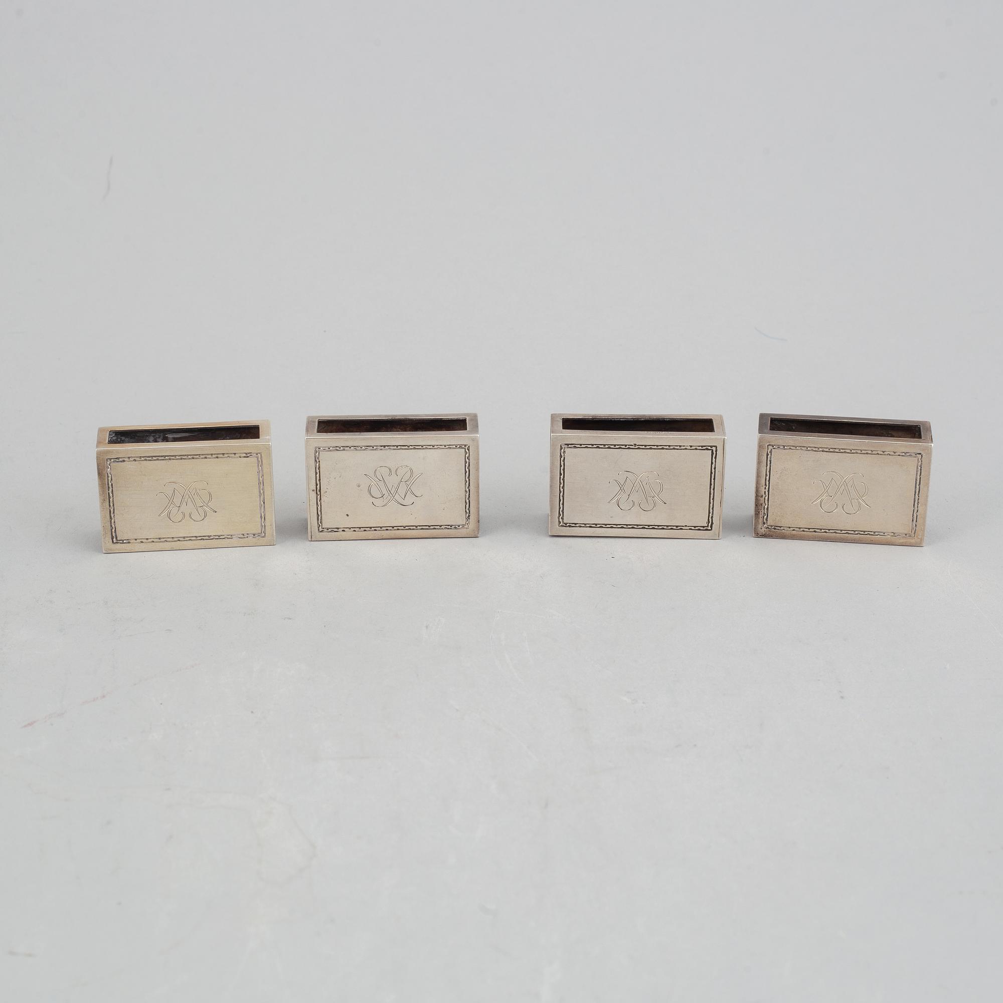 Atelier Borgila, 4 tändsticksfodral samt läskpappersvagga, silver, Stockholm 1922 samt 1939.