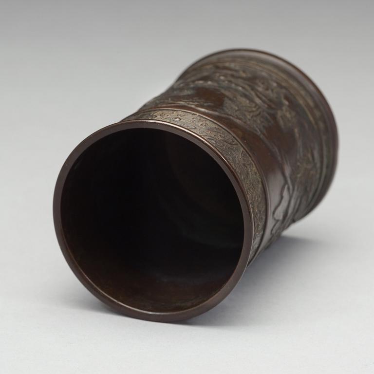 A bronze brush pot, Qing dynasty, circa 1900.