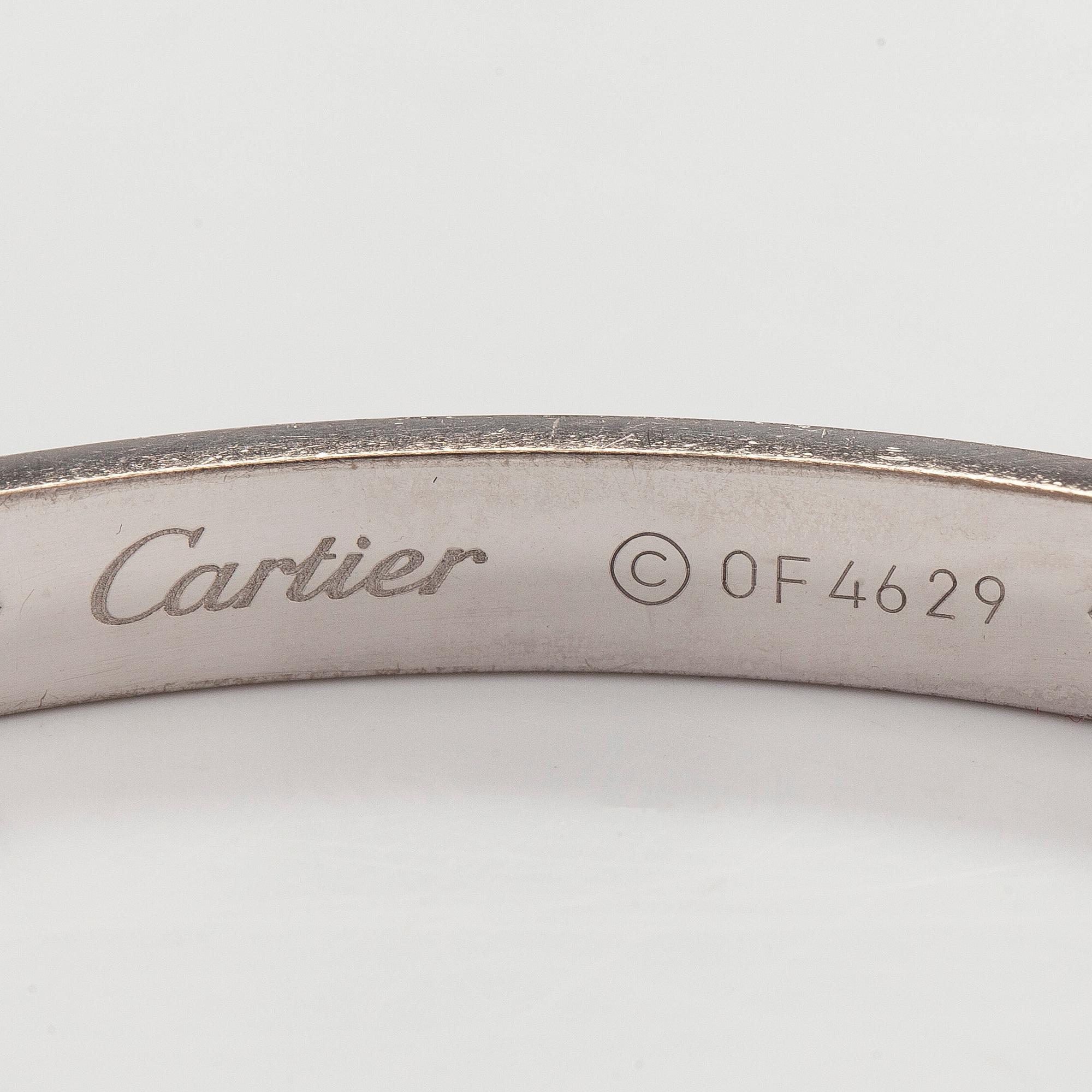 Cartier, rannekoru "Love", 18K valkokultaa, briljanttihiottuja timantteja.