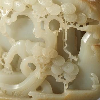 A finely carved Chinese nephrite sculpture, Qing dynasty (1644-1912).