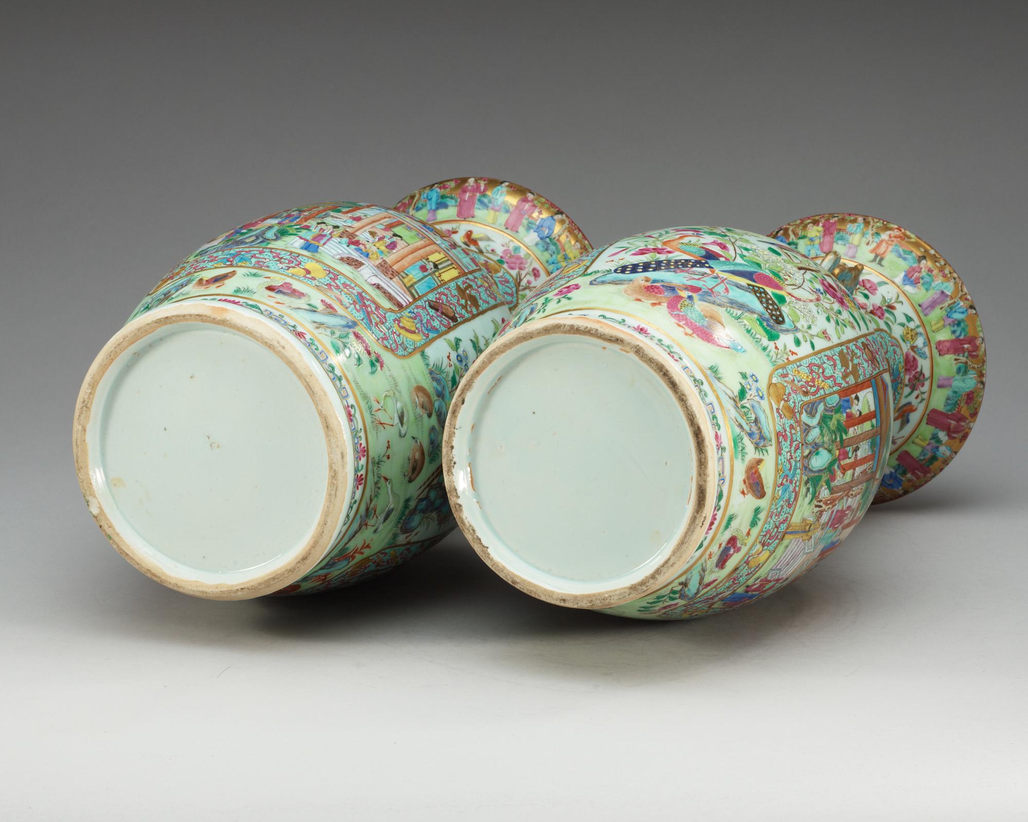A pair of famille rose Canton vases, Qing dynasty, 19th Century.