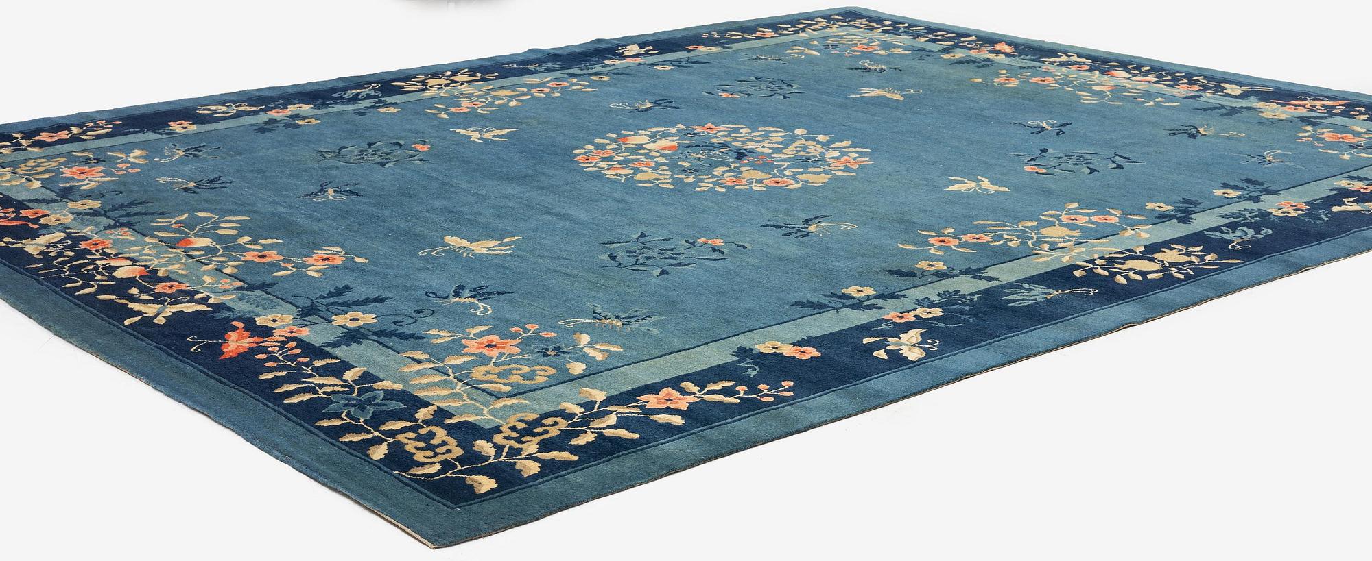 An antique Beijing carpet, northern China, c. 365 x 294 cm.