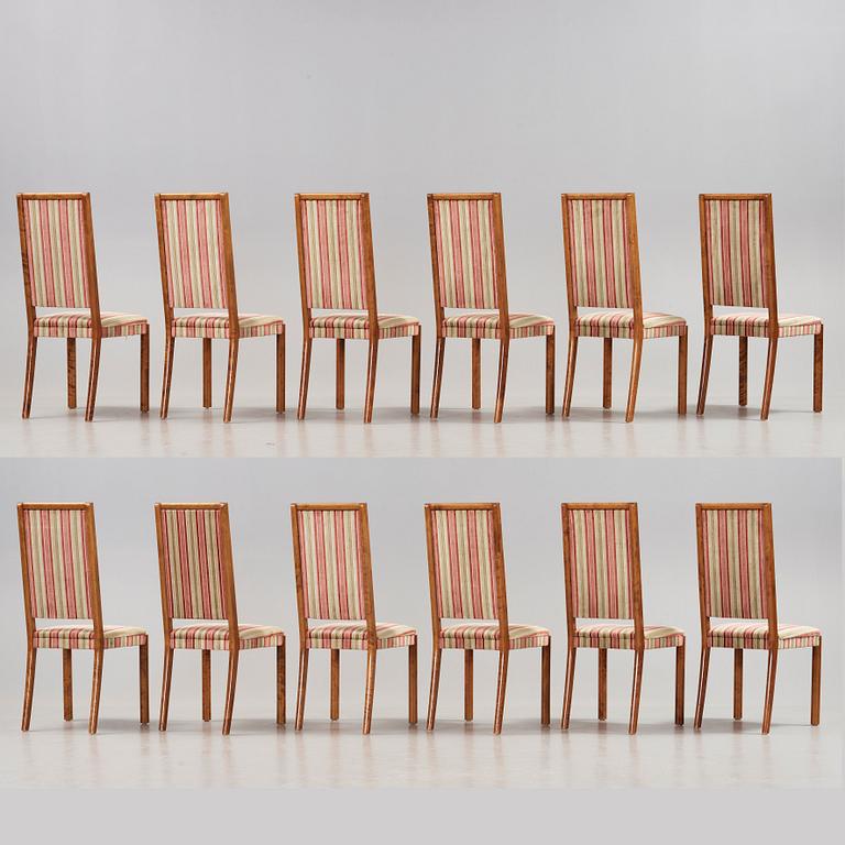 Wiwen Nilsson, a stained birch dining room set with a table and twelve chairs, Sweden 1930-40-tal.