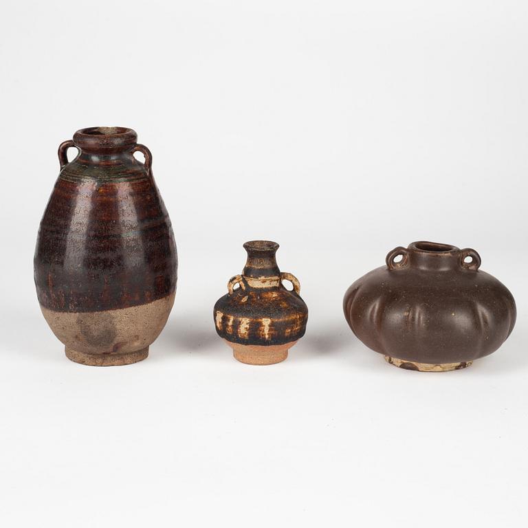 A group of brown glazed South East Asian potteries, 14th/17th Century.