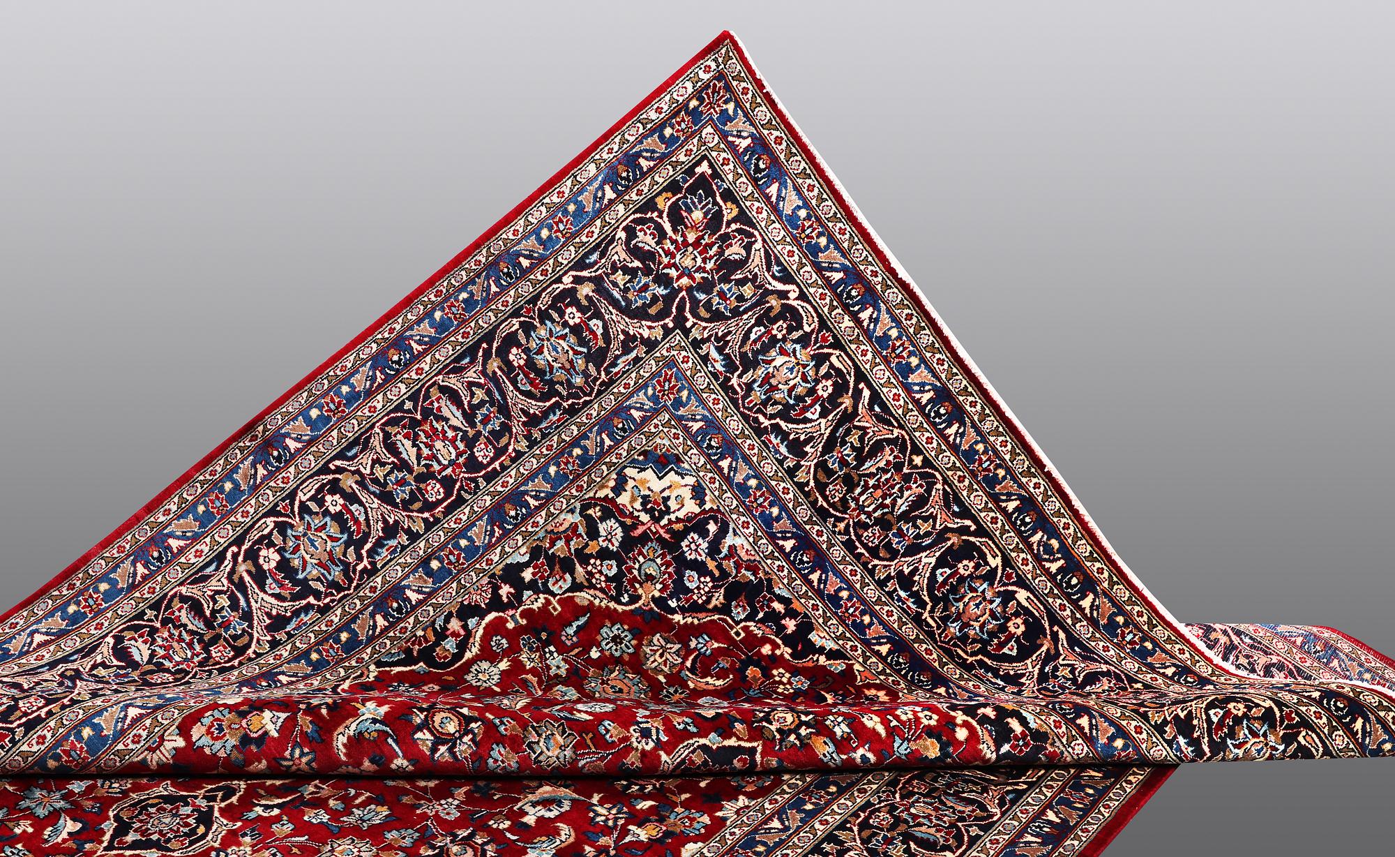 A carpet, Mashad, ca 346 x 248 cm.