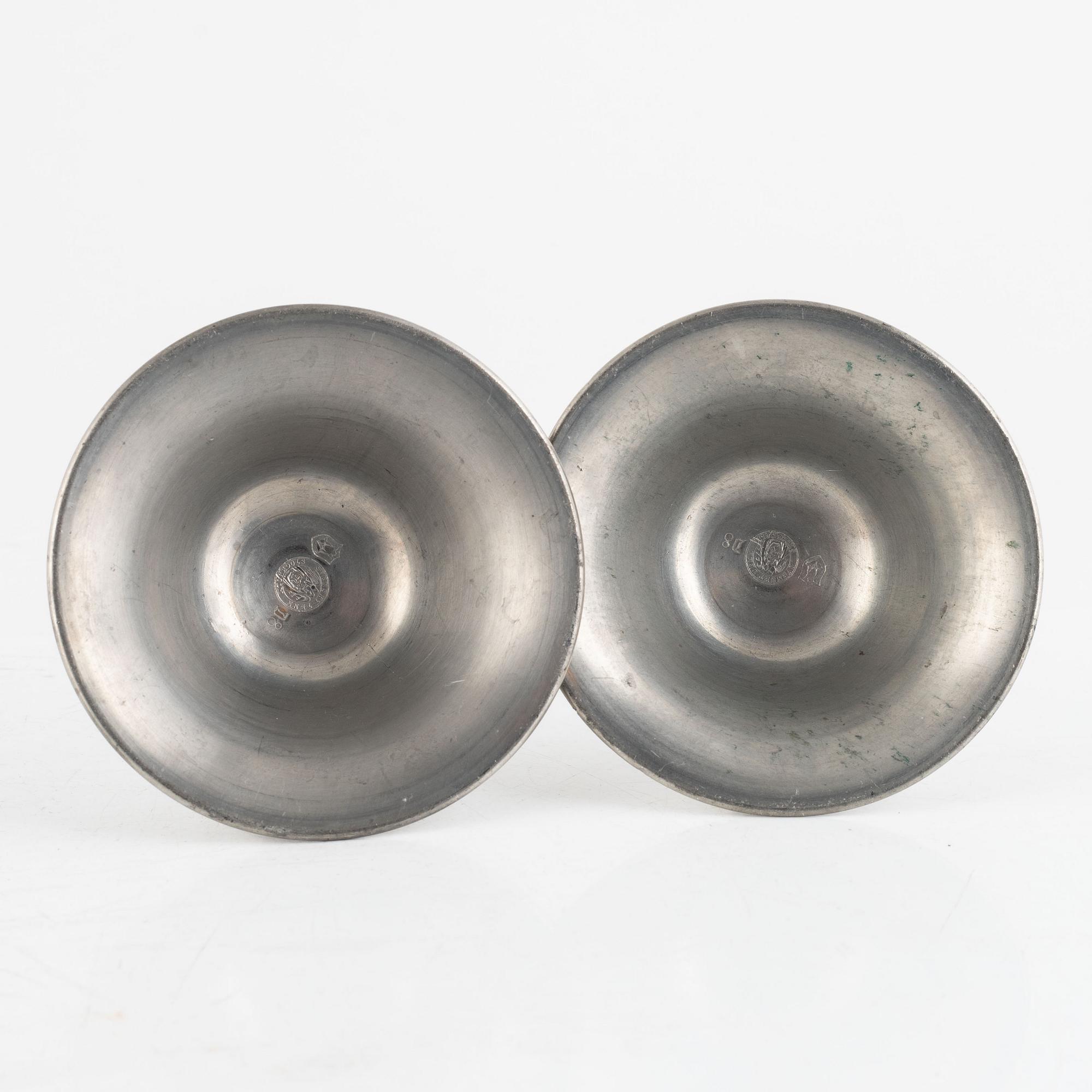 Firma Svenskt Tenn, a pair of pewter candlesticks model "76", Stockholm 1930.
