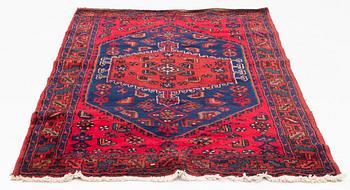 A carpet, circa 201 x 134 cm.