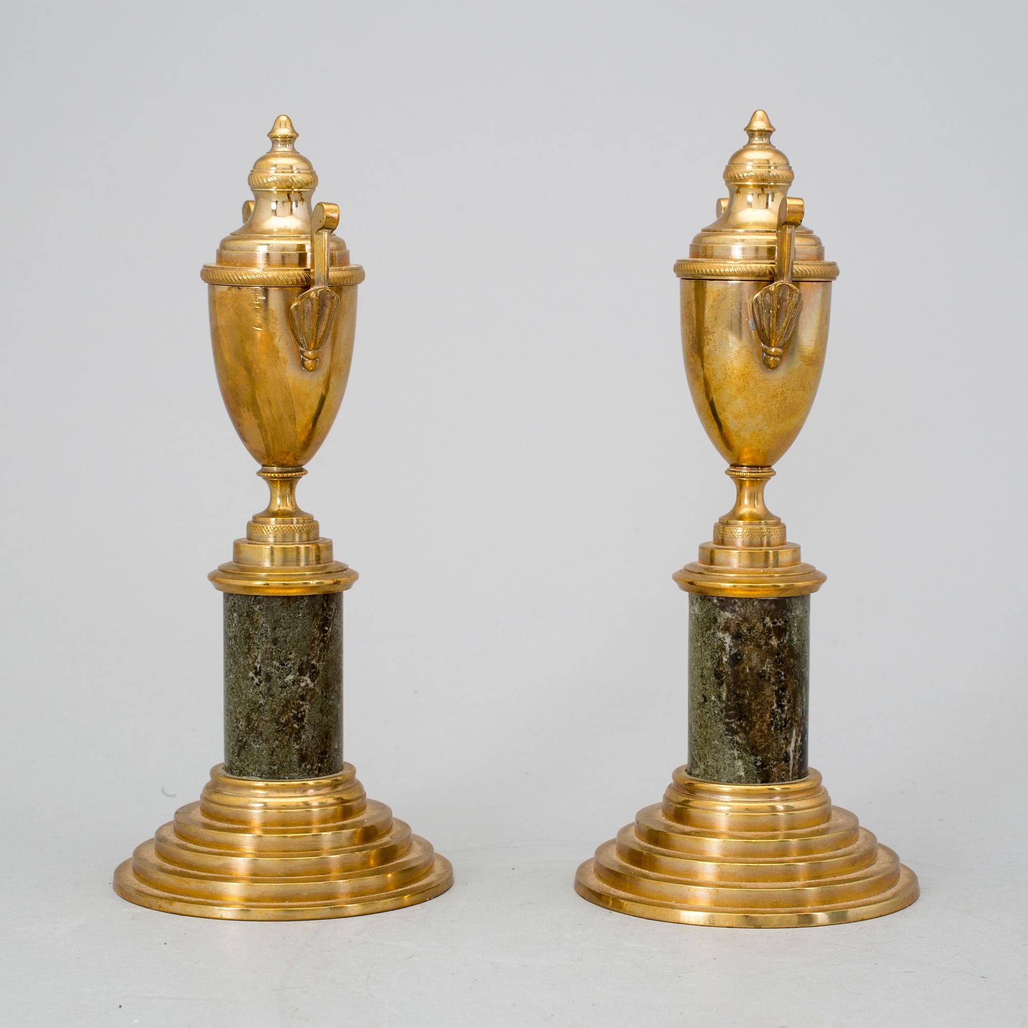A pair of brass cassolettes No 110 Skultuna early 20th century.