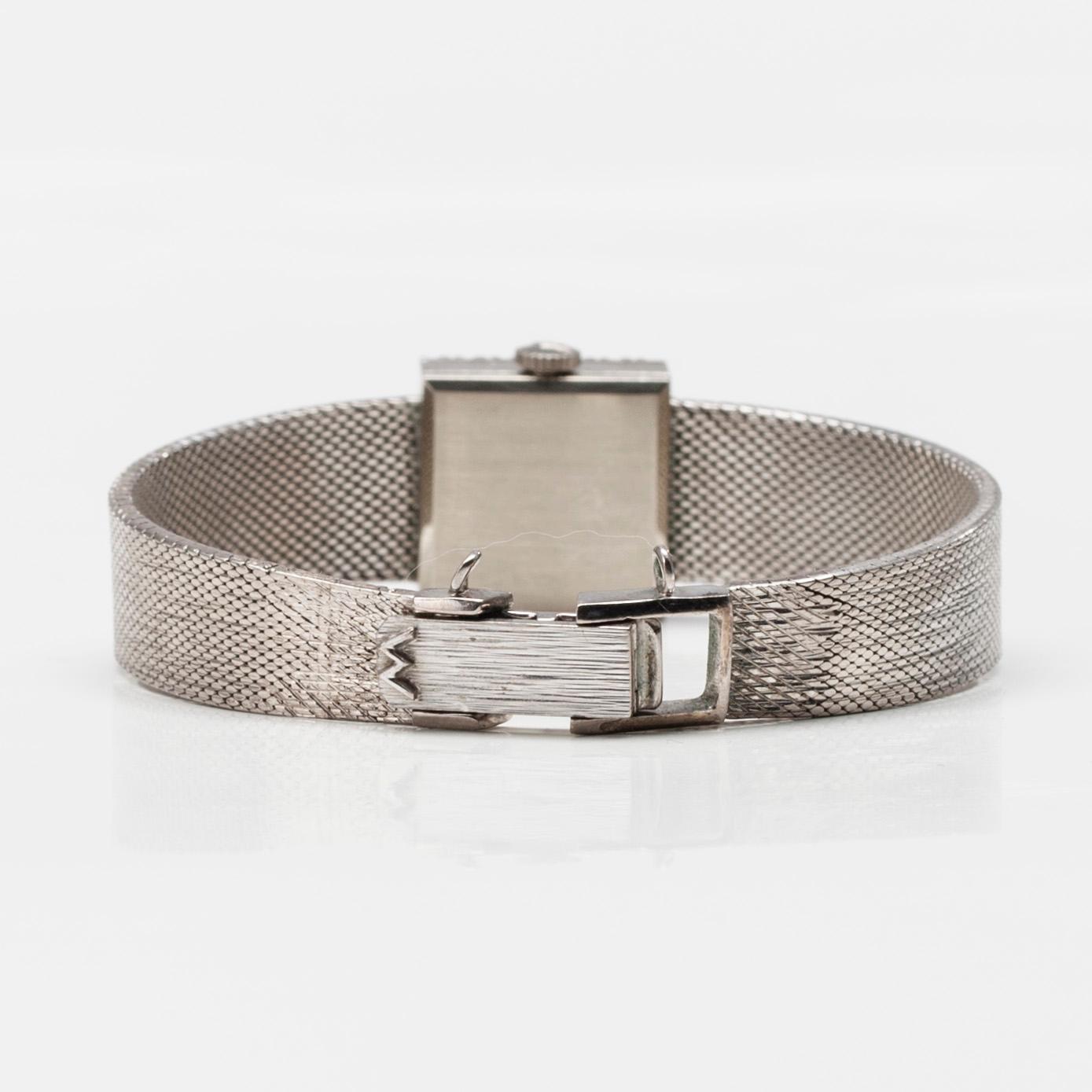 ARMBANDSUR, dam, Movado, 14K vitguld, 24 diamanter. Schweiz. Vikt tot. 35 g.