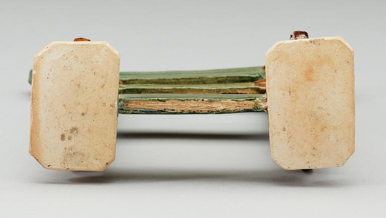 A green and brown glazed pottery stand/gate, Ming dynasty (1368-1644).