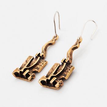 A pair of Jorma Laine earrings in bronze.