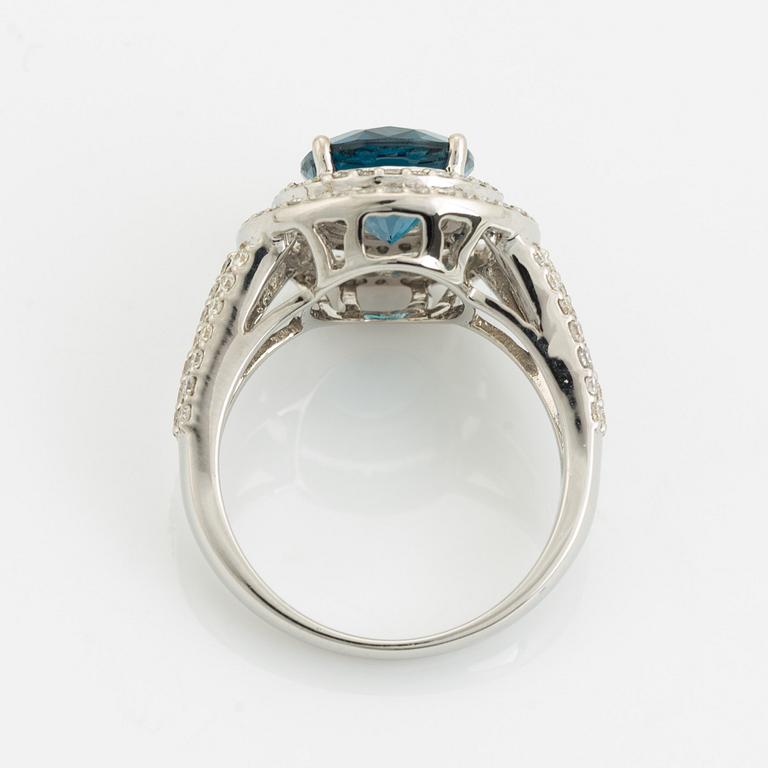 Topaz and brilliant cut diamond ring.