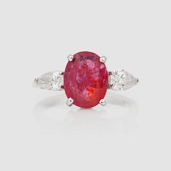 1362. A 4.11 ct untreated natural ruby and pear-shaped diamond ring. Total carat weight circa 0.50 cts.