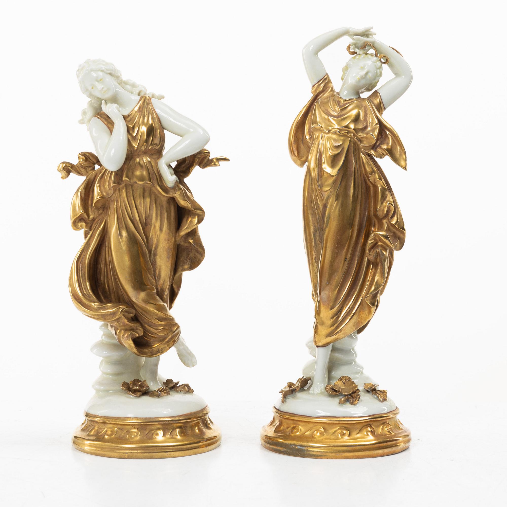 A pair of gilt "Muse" porcelain figurines, Volkstedt, first part of the 20th century.