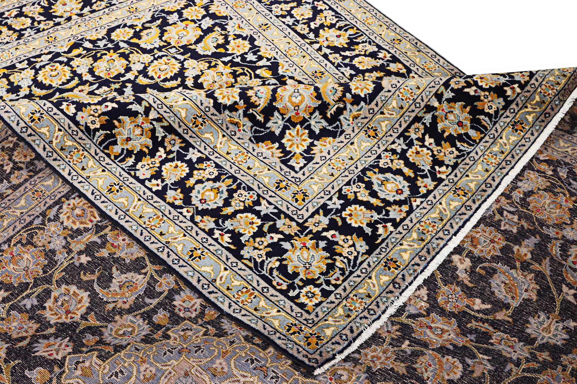 A Kashan carpet, c. 365 x 259 cm.