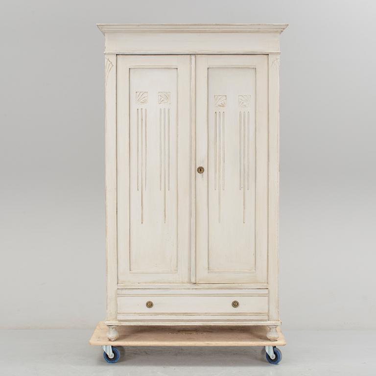 A wardrobe, circa 1900.