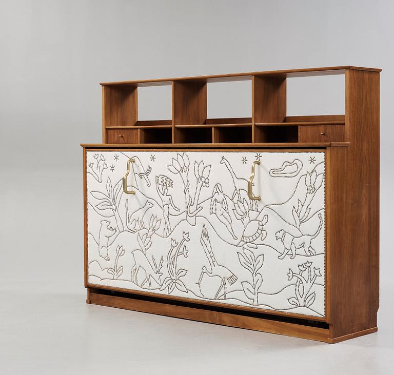 An Otto Schulz white artificial leather and walnut cabinet (with a bed), Boet, Gothenburg 1930-40's.