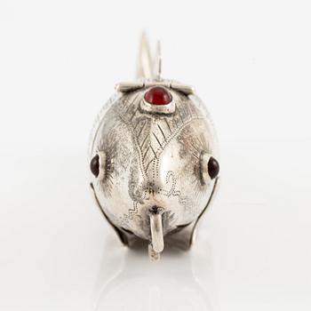 Pendant in the form of a fish, silver with red stones.