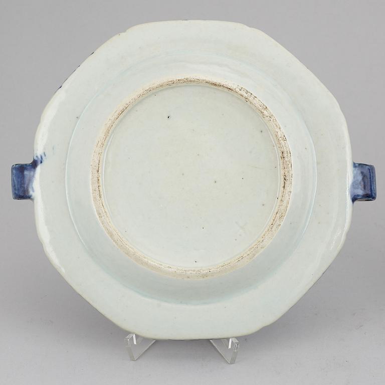 A set of three blue and white plates and a hot water dish, Qing dynasty, 18th/19th Century.