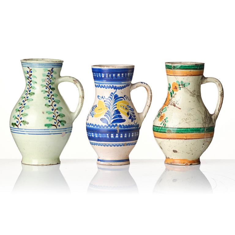 A group of seven European faiance and earthenware pitchers, partly France and Italy 19th century.