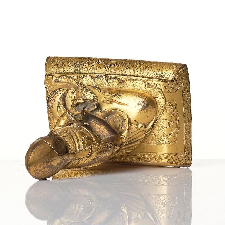 A gilt bronze figure of a Lama, Tibeto-Chinese, 18th/19th century.