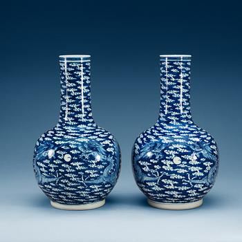 A pair of blue and white vases, late Qing dynasty, with Kangxi four character mark.