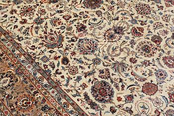 A carpet, old Keshan, approx. 418 x 314 cm.