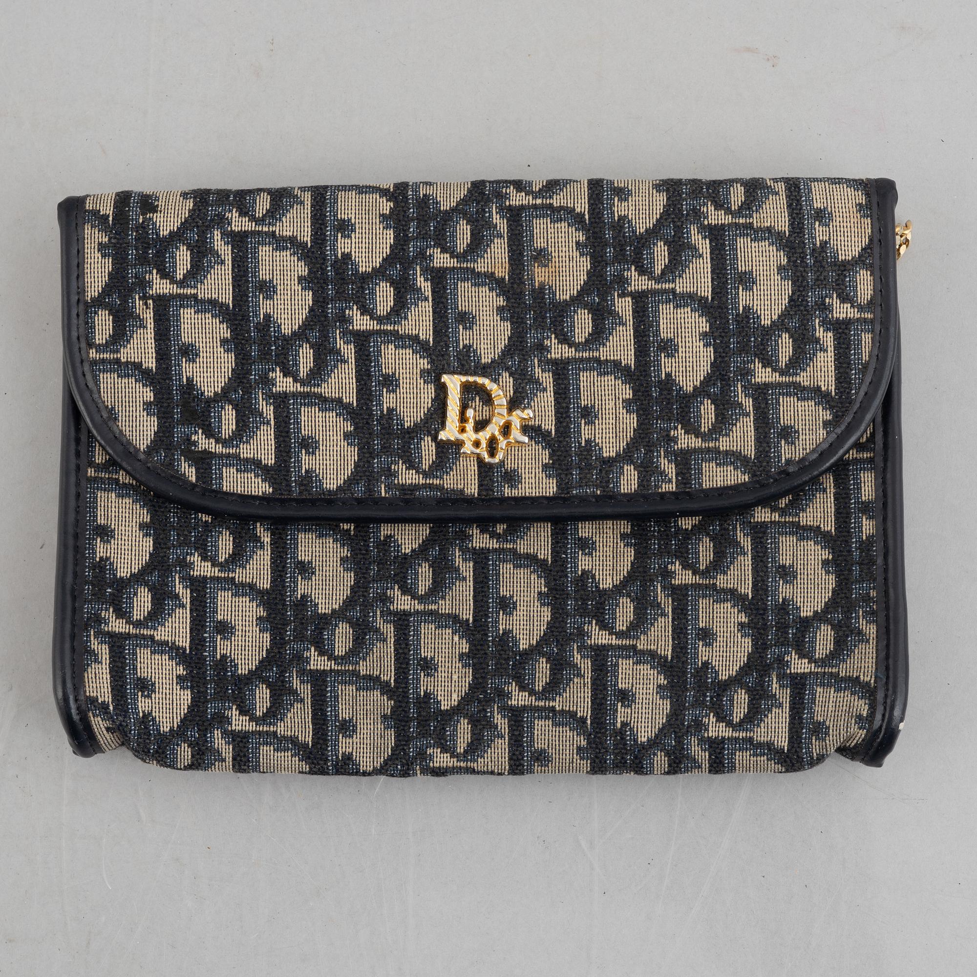 Christian Dior, a handbag/clutch.