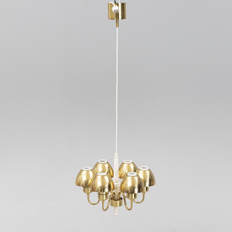 Hans-Agne Jakobsson, a 'T526' brass and wood ceiling light from Markaryd.