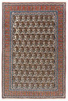 An oriental rug, c. 207 x 138 cm.