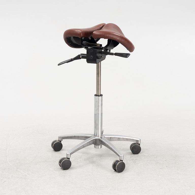 A 21 st century saddle stool from Salli, Finland.