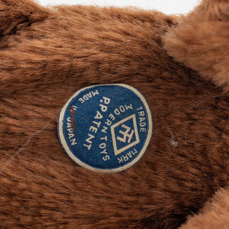 A set of five toys, including 'Rolly' clown from Schuco, 20th century.