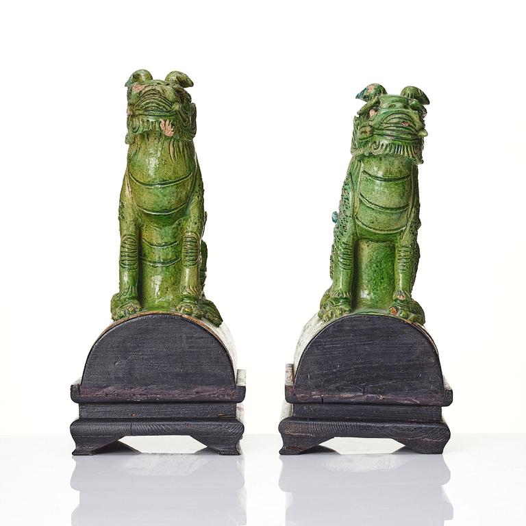 A pair of green glazed roof tiles, Ming dynasty (1368-1644).