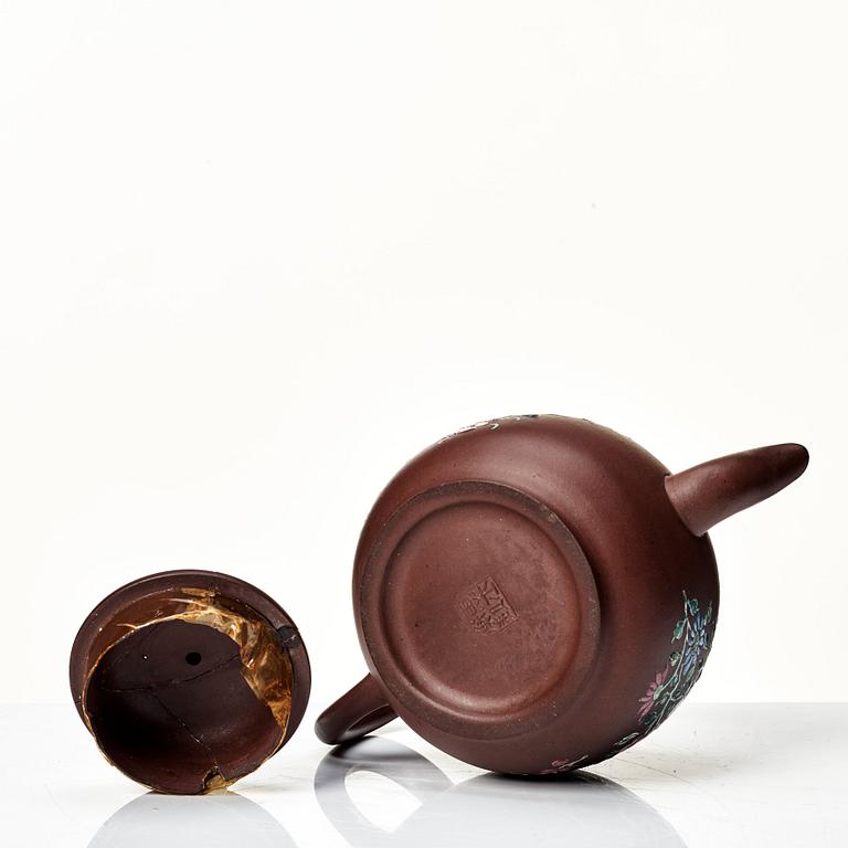 A yixing ware tea pot with cover, Qing dynasty, 18th Century.