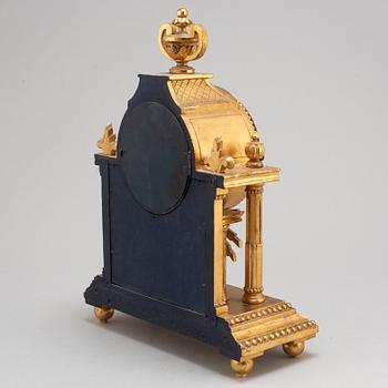 A Gustavian style mantle clock, signed C.A. Carlsson 12/12 1913 Nyköping.