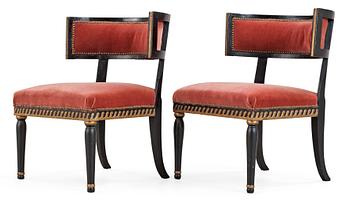 A pair of late Gustavian armchairs.