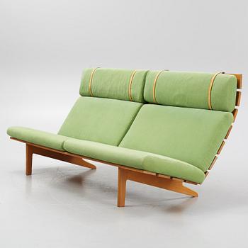 A sofa with a stool, Erik Jørgensen Møbelfabrik, Denmark.