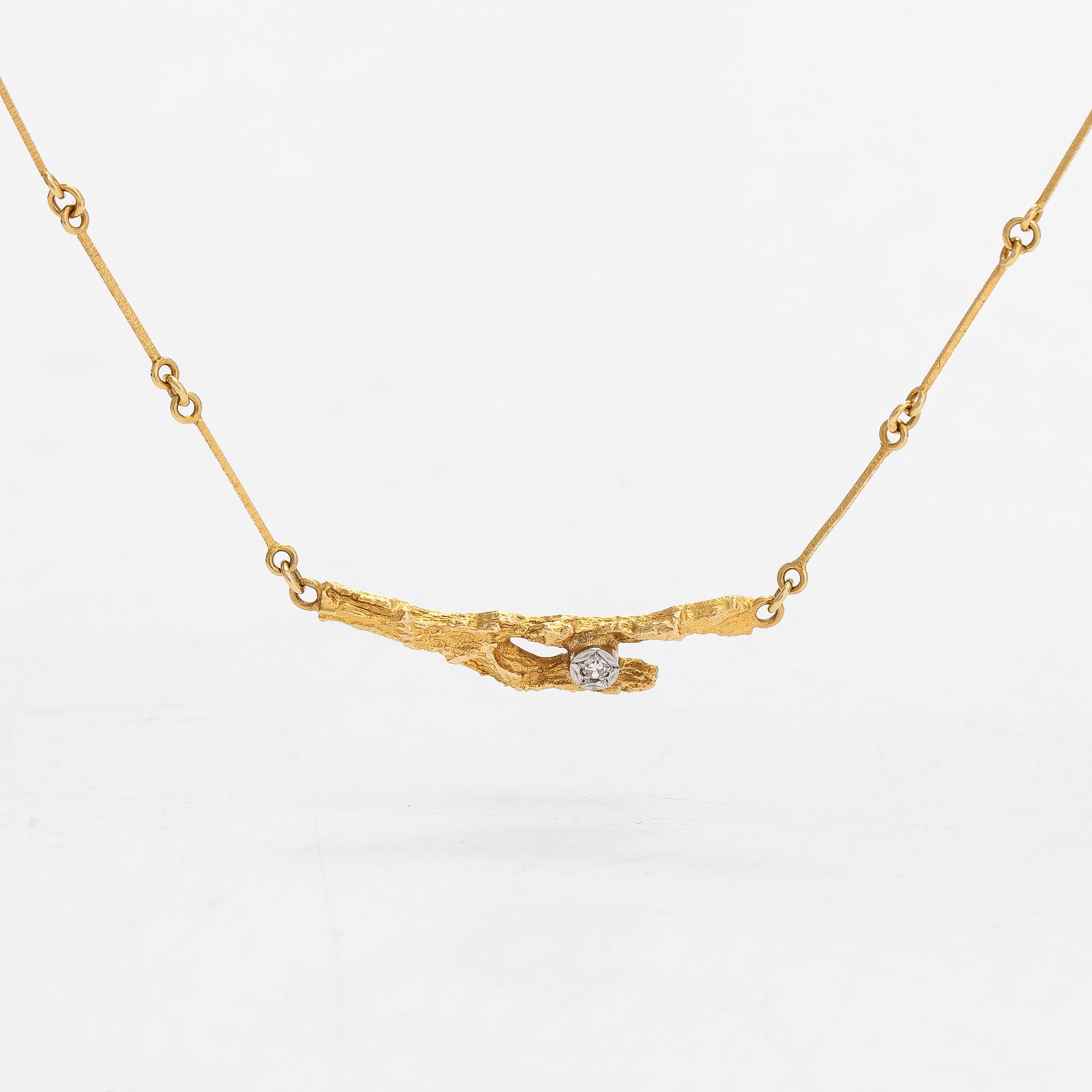 Björn Weckström, An 18K gold necklace "Diamondbud" with an eight-cut diamond ca 0.02 ct. Lapponia 1979.