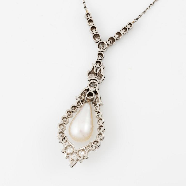 A platinum necklace with a drop-shaped pearl.