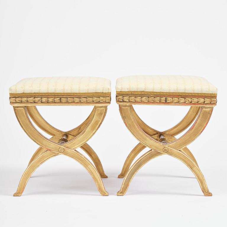 A pair of late Gustavian giltwood stools, Stockholm, late 18th century.